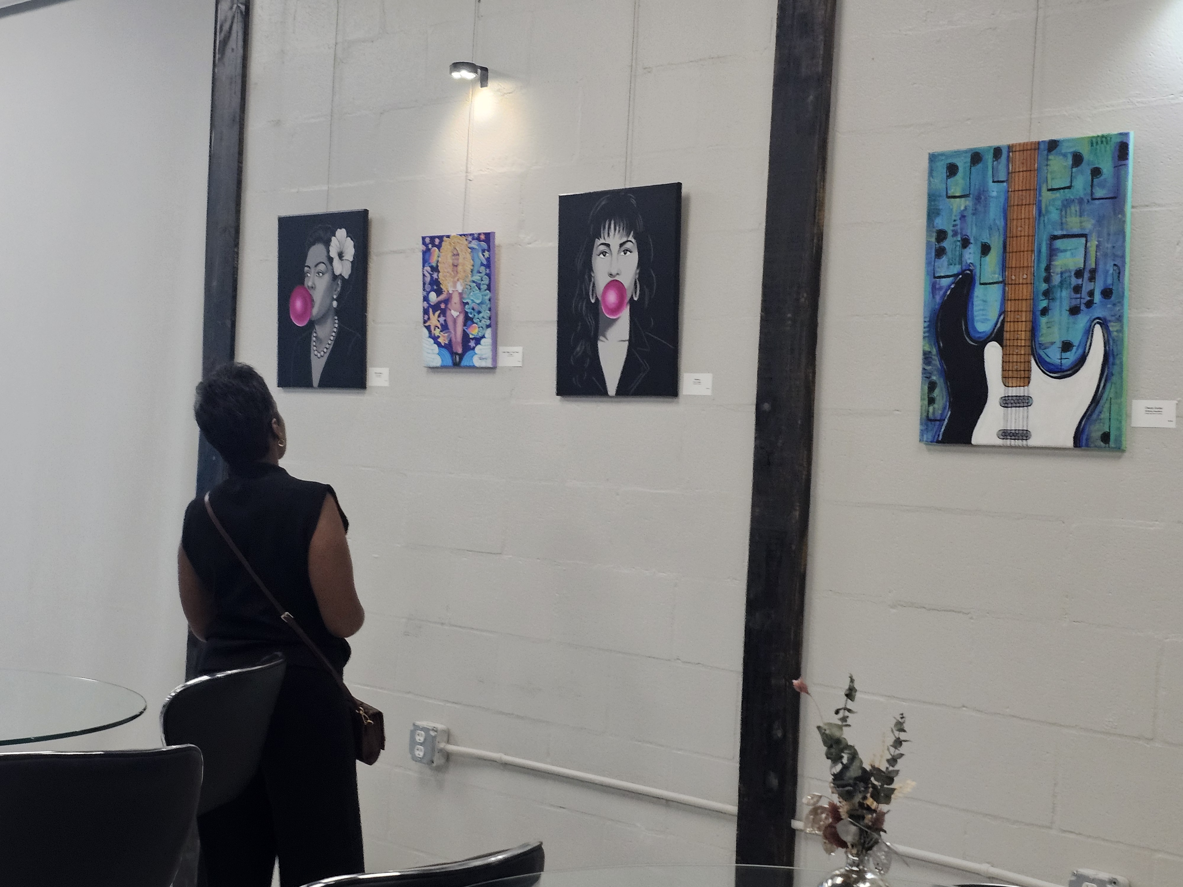Crowd mingling at After Dark Art Gallery